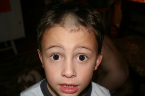 "Mama? I used the scissors to cut my hair."