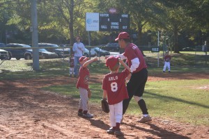 Coach Fred approaches to hit the rock!