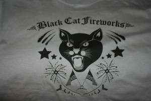 Black Cat I have a thing for the Black Cat Fireworks logo. It cracks me up, always has. Todd finally got the hint and got me a Black Cat shirt! Rowr!