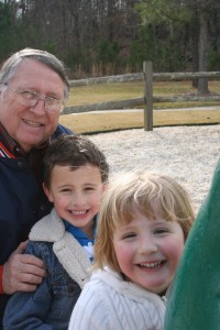 Papaw J., Rollie, and Tiller And then we hugged some more and rode the dinosaur at the park.
