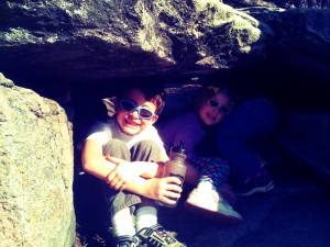The kids like to go in this weird stone formation. It is right at the steepest part of the trail. 