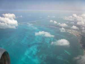 View from the plane over Cancun. The reason i am able to take photos like this from the plane window is that i pop Xanax like candy before and during the flight so as not to give in to my fear and run up and down the aisles screaming, "We're going down! We're all gonna die!"