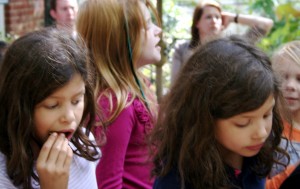 . . . with the help of the older twins, Leah and Sydney. Syd needs snack to help her think. 