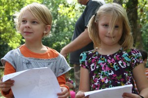 The girls use the map to figure out the next clue. 