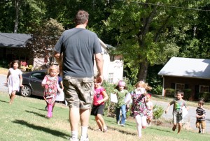 Todd, the Cluemaster, about to be stampeded by children with the Ghoulish Garden clue.
