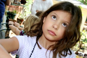 Syndey, wearing her beads from the treasure chest.