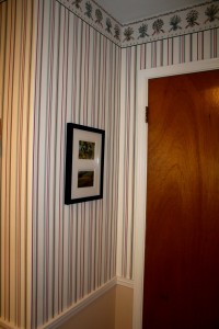 This is the wall space wasted by the door to the foyer. We usually have the door open, so this is covered. 