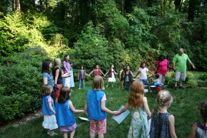 Then all the girls and their parents and siblings held hands in a big circle and they girls sang some girl scout song. I lurked in the trees taking pictures. 
