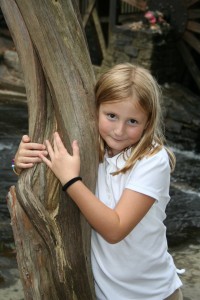 And here she is today. Brownie bridging ceremony at Stone Mountain Park Grist Mill. Almost 8 years old, 2nd grade, October 2013. 