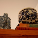 Books with Mug and Pottery